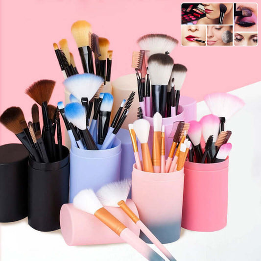 12-piece professional makeup brush set displayed in colorful containers against a pink background.