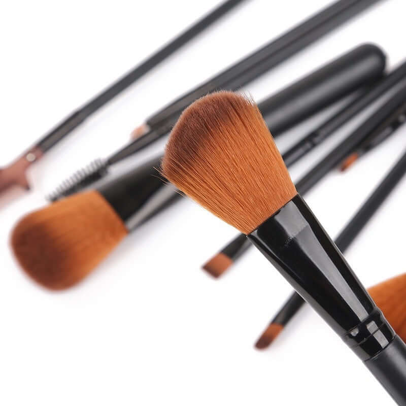 12-piece professional makeup brush set featuring soft bristles and sleek black handles, perfect for makeup application.