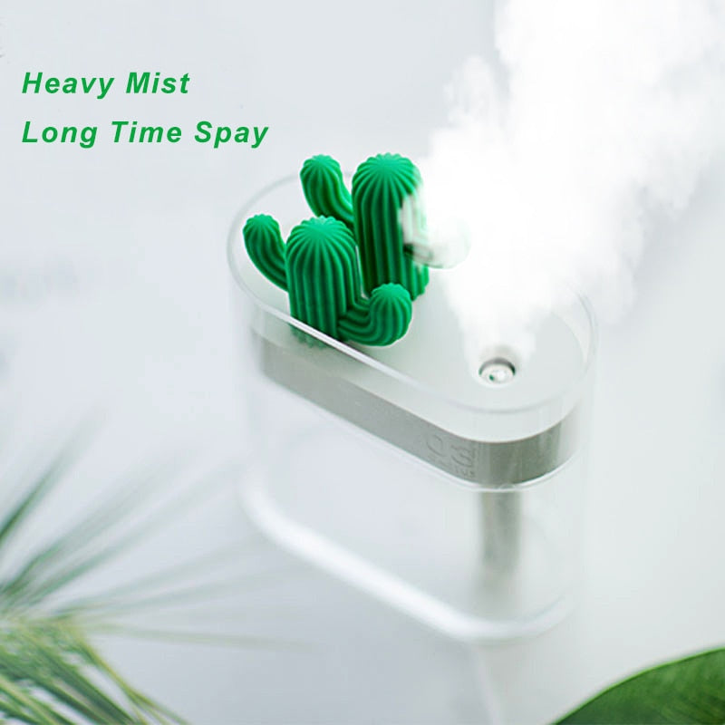 160ML ultrasonic air humidifier with a cactus design, emitting heavy mist for long-lasting moisture.